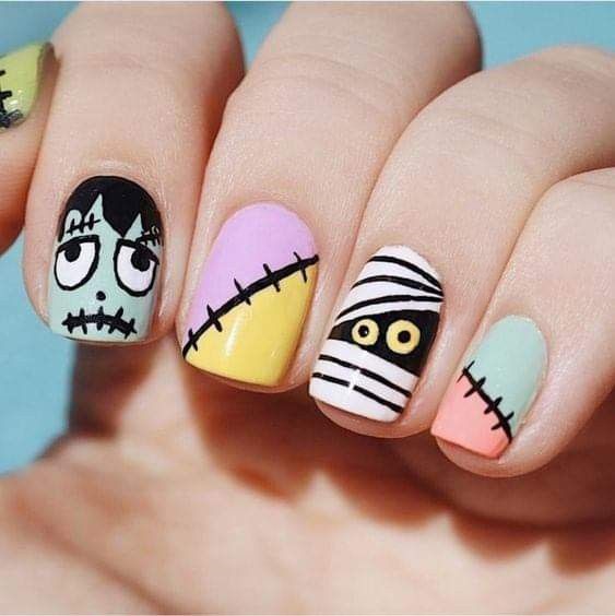 21 Spooky and Stylish Halloween Nail Ideas: From Cute Ghosts to Bold Acrylics