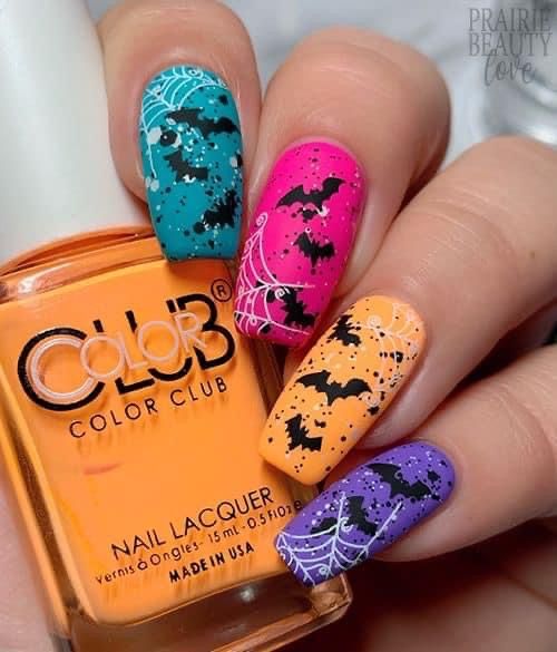 21 Spooky and Stylish Halloween Nail Ideas: From Cute Ghosts to Bold Acrylics