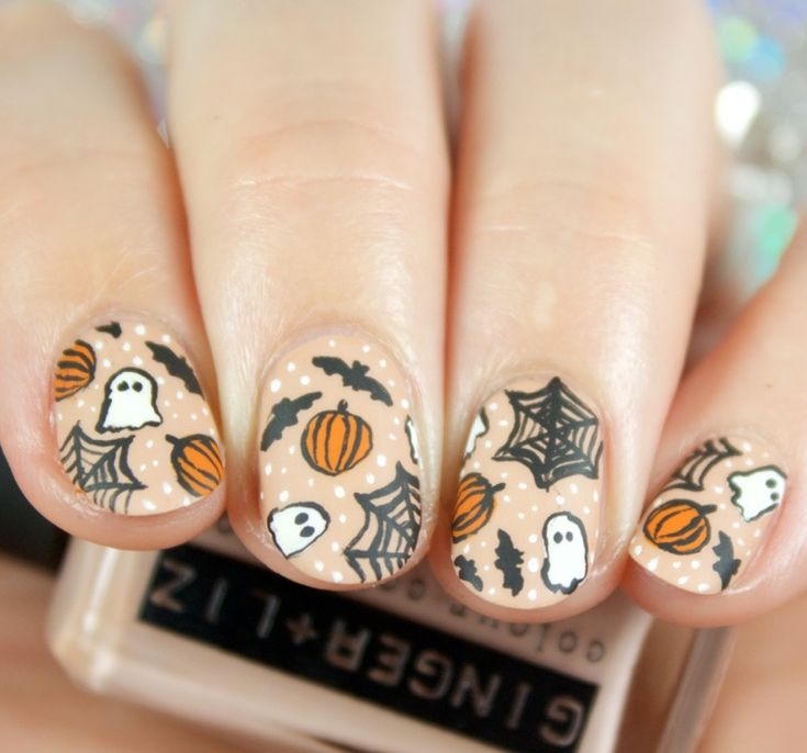 21 Spooky and Stylish Halloween Nail Ideas: From Cute Ghosts to Bold Acrylics