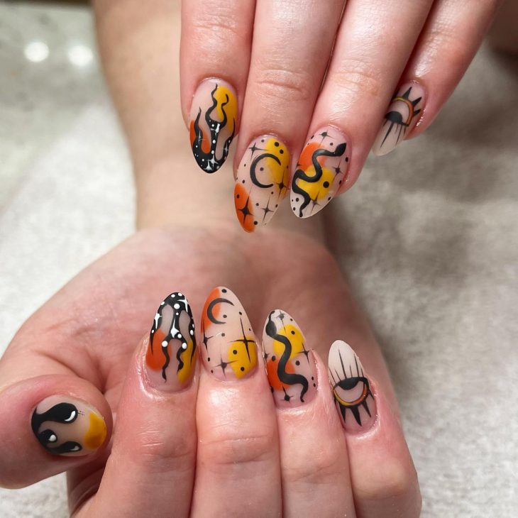 20 Witchy Nails Ideas: Almond, Stiletto, and Coffin Shapes for a Mystical Manicure