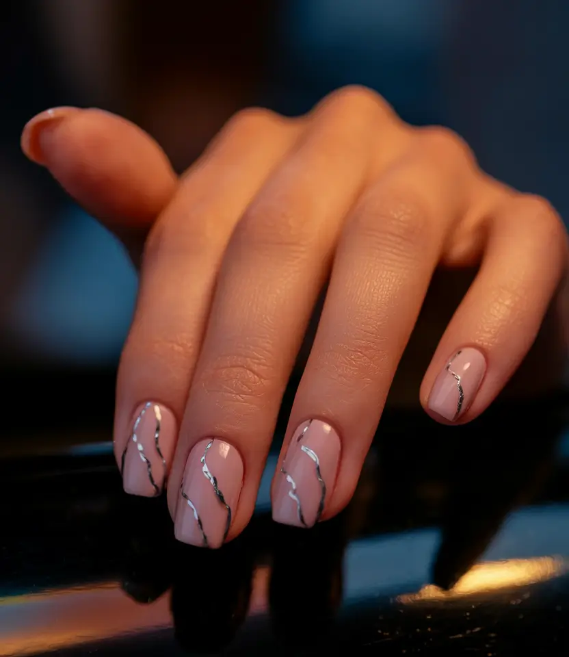 short nail inspo summer Soft Nude Base with Silver Wavy Lines