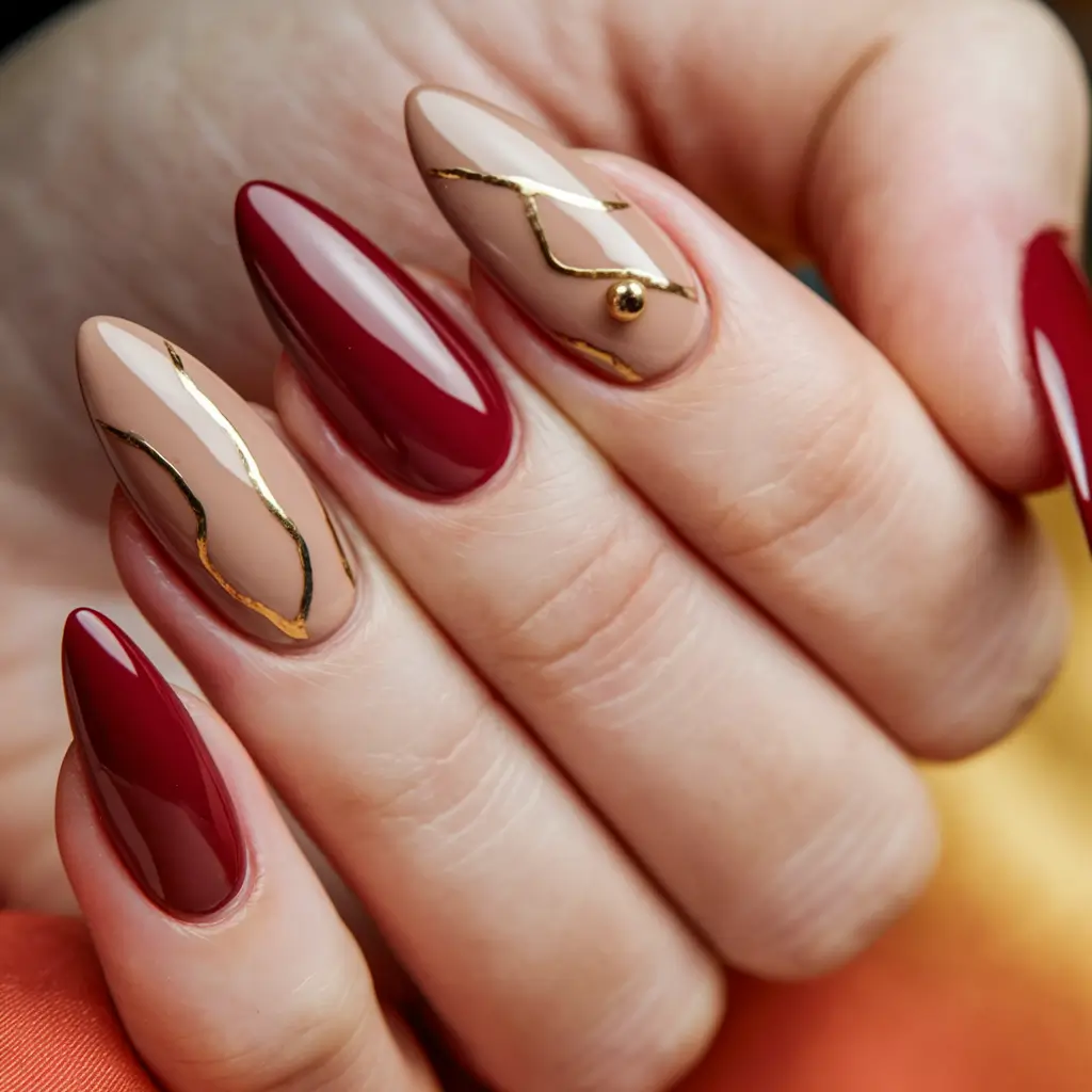 almond nails summer red Deep Ruby Meets Golden Maze