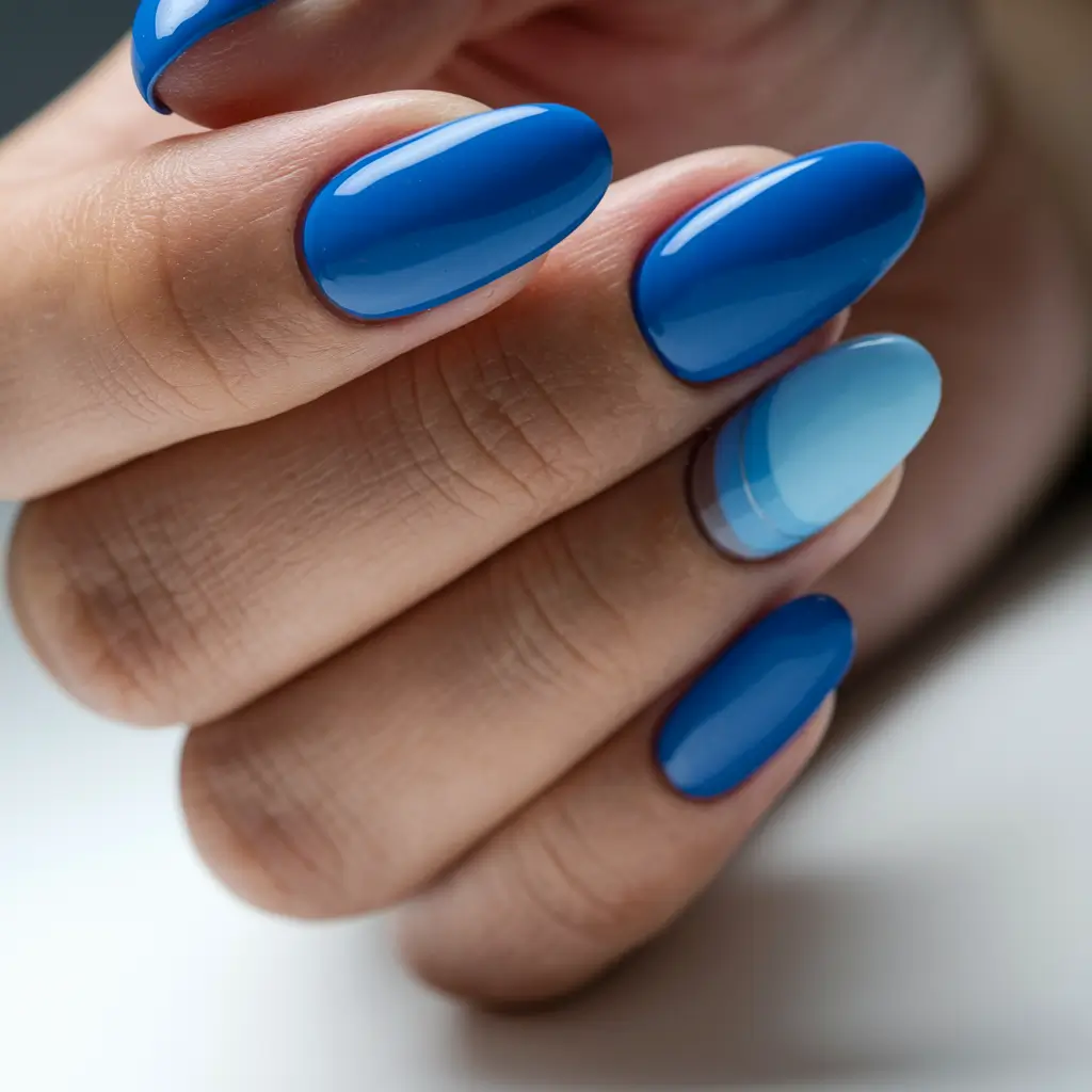 French Tip Nails with a Summer 2025 Twist Electric Blue Meets Sky Gradient