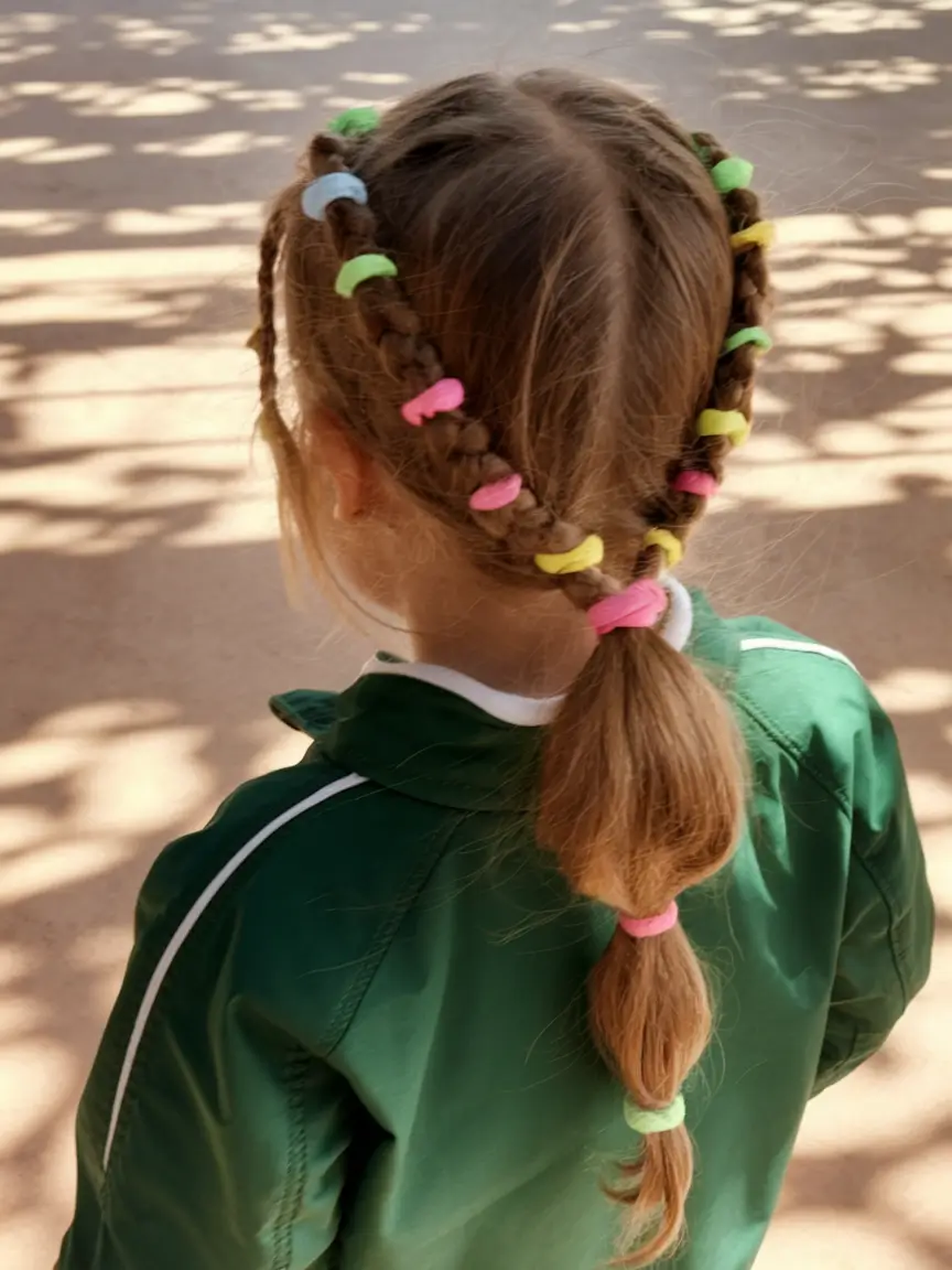 hairstyles-for-school-2025-colorful-beaded-braids-for-school-fun