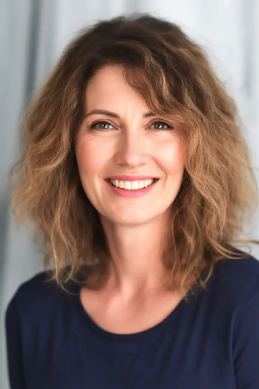 fall hair color for women over 40 haircolor Golden Bronde Waves with a Sun-Lit Finish