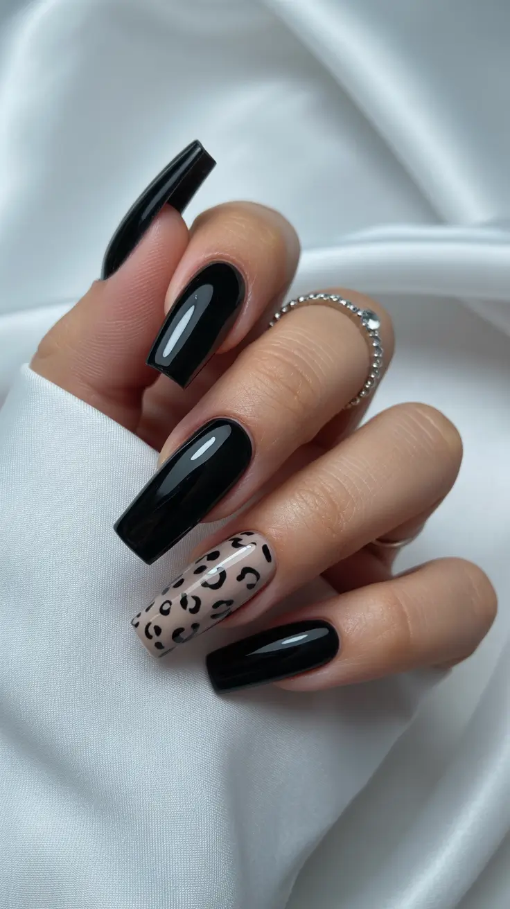 Animal Print Nails for Fall 2025 - Ink-Black Lacquer With Taupe Leopard Accent
