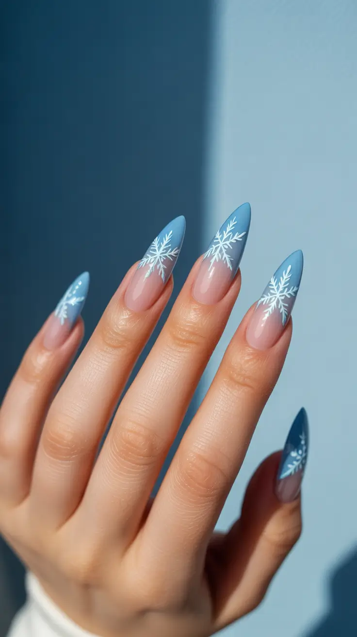Snowflake Nail Designs for Winter 2025-2026 - Frost-Tipped Almonds in Light Blue