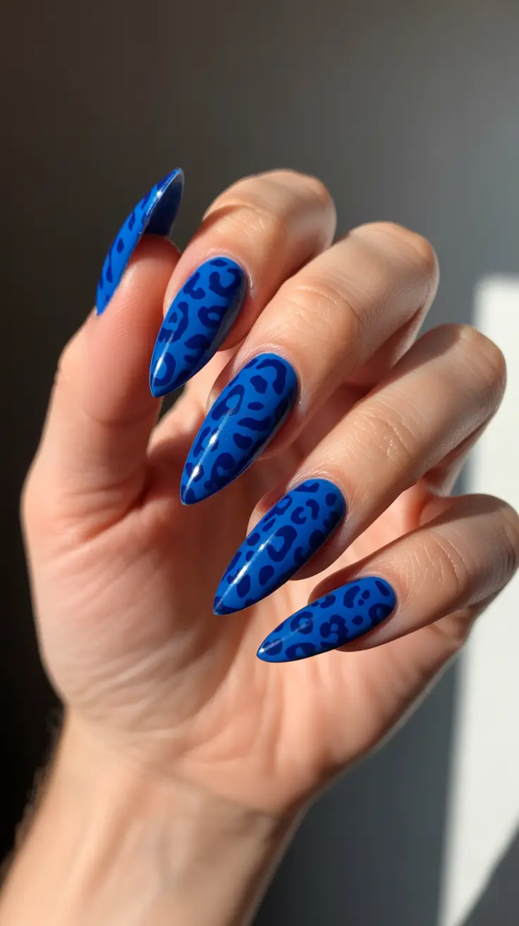 acrylic nail ideas 2026 Cobalt Leopard Almond Stilettos