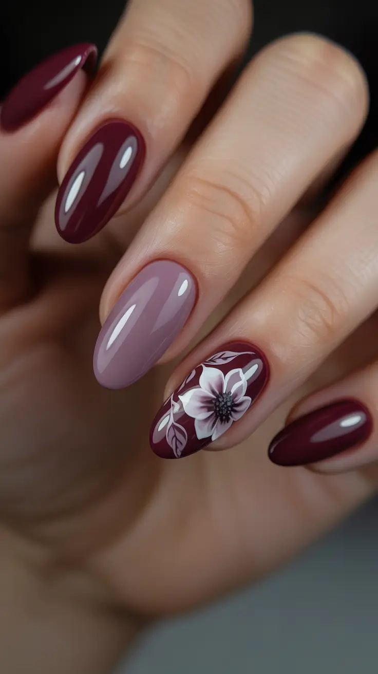 elegant nails 2026 Moody Berry And Mauve With A Floral Statement
