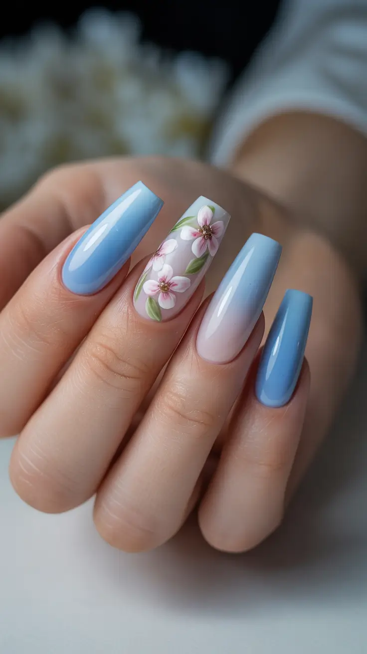 blue nails for 2026 - Blue Acrylic Ombre With A Blush Blossom Accent