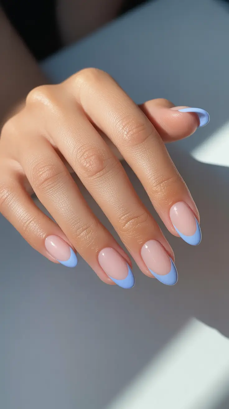 simple nail designs 2026 - Sky Blue French On Almond Tips