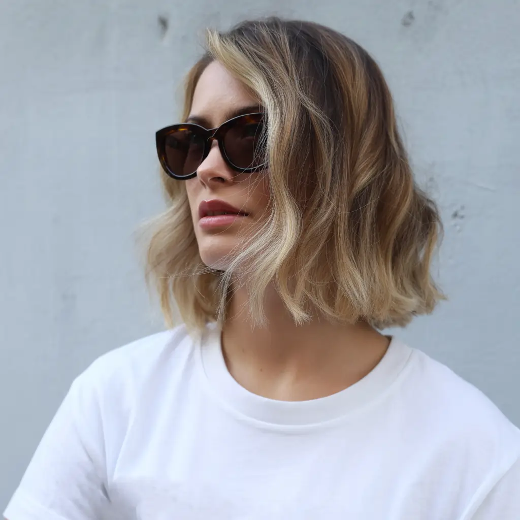 modern spring bob haircuts 2026 Wavy Beach Blonde Bob With Soft Texture
